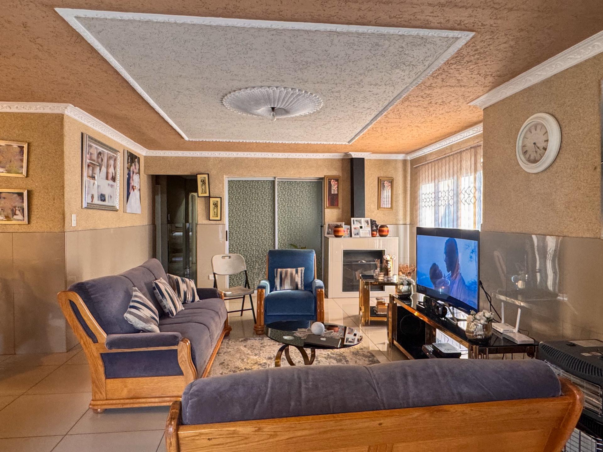 4 Bedroom Family Home with Double Garage and Outside Room For Sale in Hospital View, Kagiso — image 11
