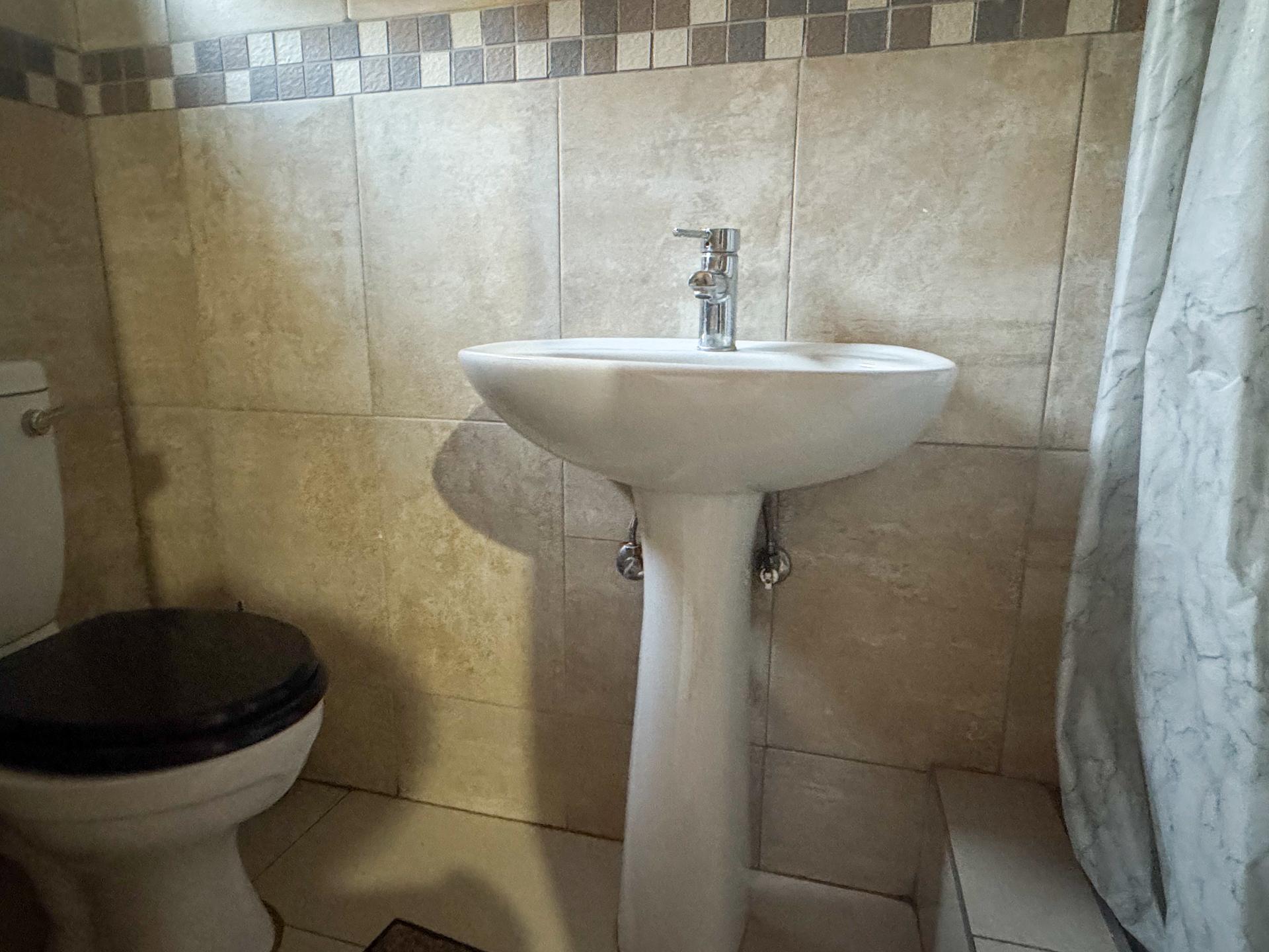4 Bedroom Family Home with Double Garage and Outside Room For Sale in Hospital View, Kagiso — image 16