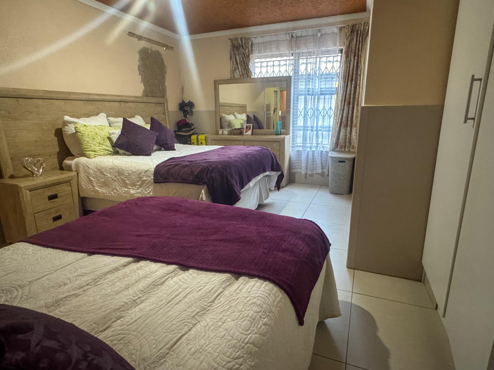4 Bedroom Family Home with Double Garage and Outside Room For Sale in Hospital View, Kagiso — image 17