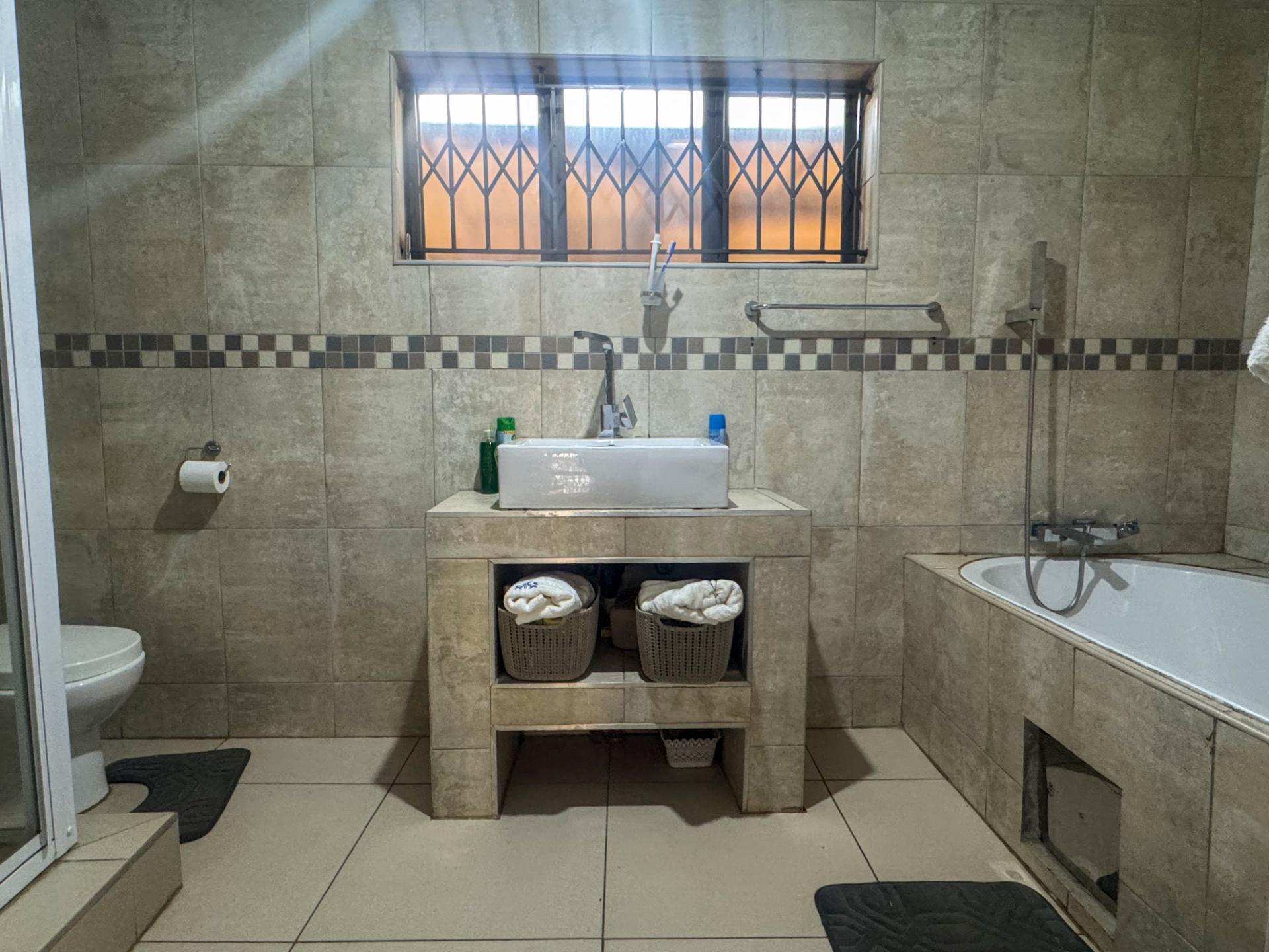 4 Bedroom Family Home with Double Garage and Outside Room For Sale in Hospital View, Kagiso — image 19