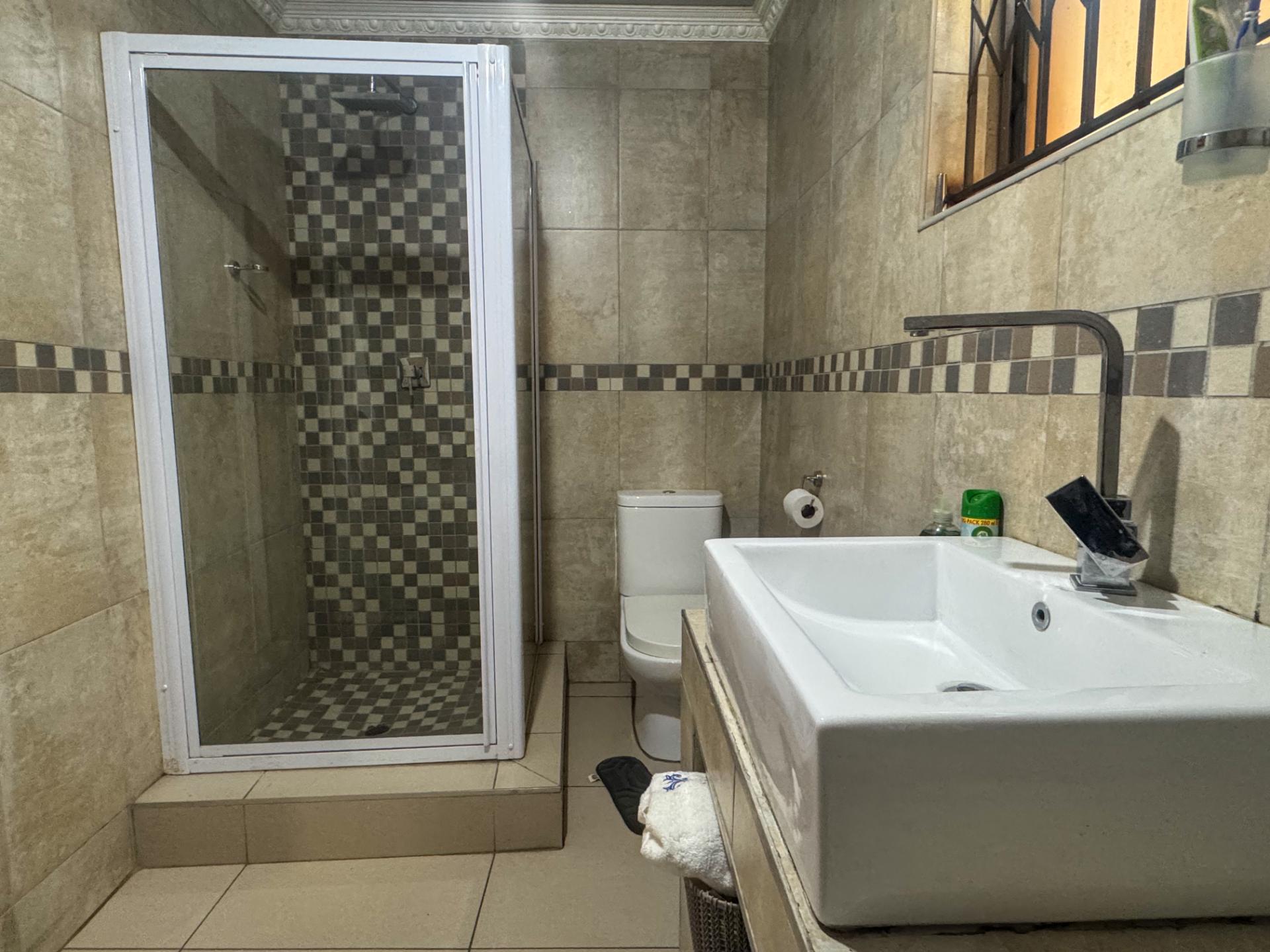 4 Bedroom Family Home with Double Garage and Outside Room For Sale in Hospital View, Kagiso — image 21