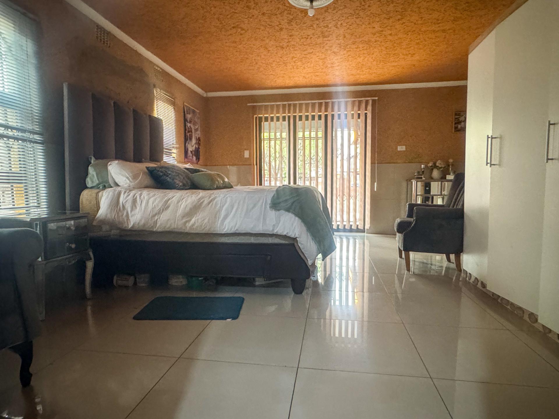 4 Bedroom Family Home with Double Garage and Outside Room For Sale in Hospital View, Kagiso — image 22