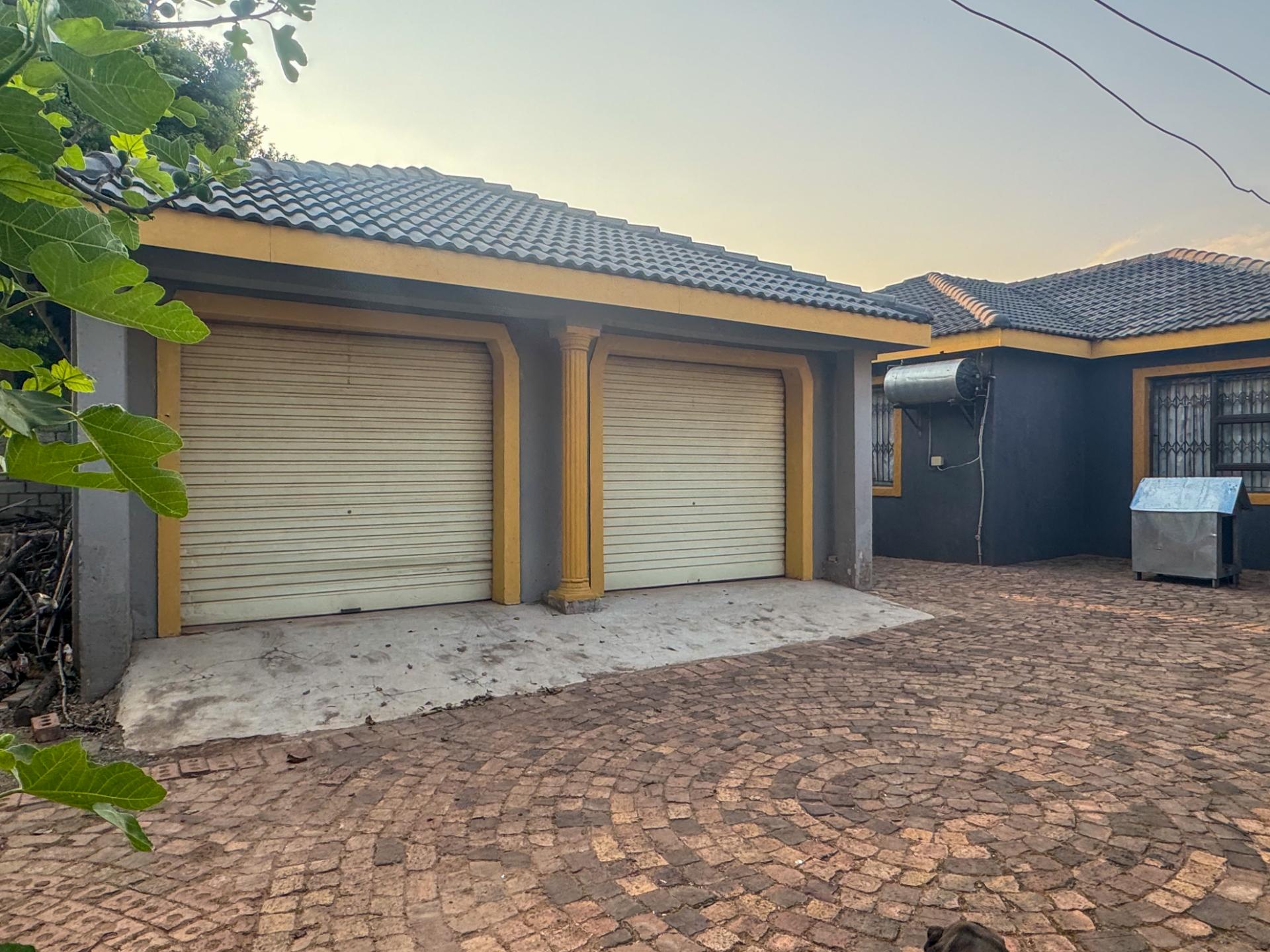 4 Bedroom Family Home with Double Garage and Outside Room For Sale in Hospital View, Kagiso — image 25