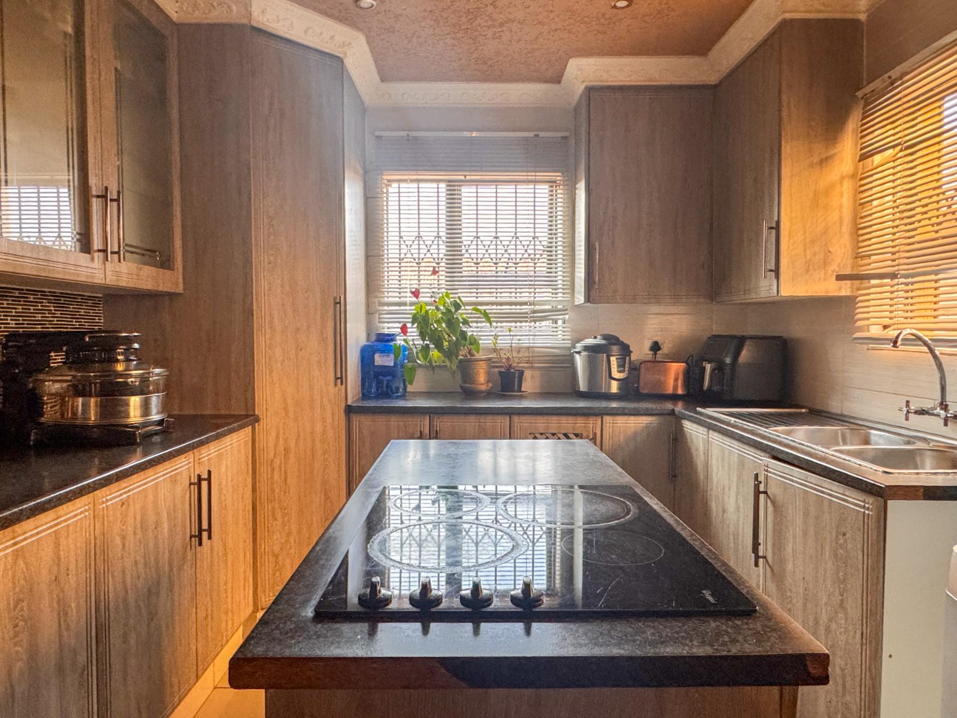 4 Bedroom Family Home with Double Garage and Outside Room For Sale in Hospital View, Kagiso — image 8